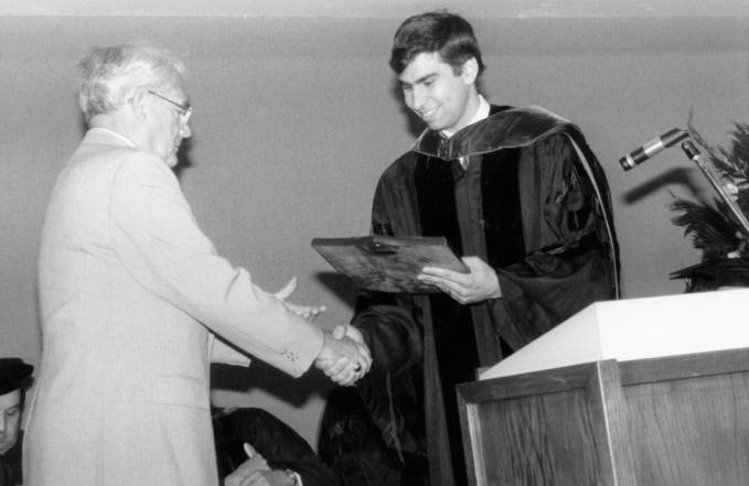 PSC college graduate receiving a diploma in 1985